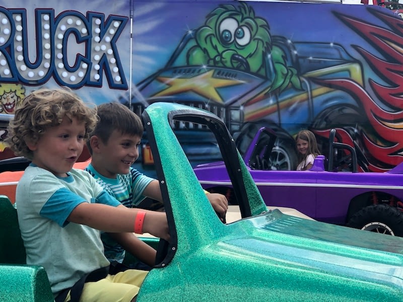 boys riding kids monster trucks at Ohio State Fair